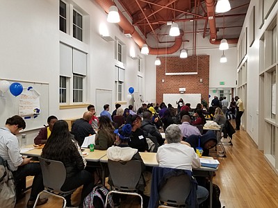 Mentors and students share ideas about getting started at the iMentor orientation November 13, 2019 at the Academy for College and Career Exploration.