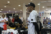 Former Negro Leagues player Luther “Luke” Atkinson of The Satchel Paige All Stars stares out into the crowd as he looks over his Negro Leagues memorabilia at The Maryland State Fair, Saturday, September 7, 2019.