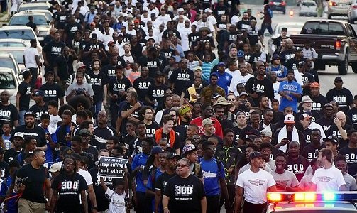 300 men march From Baltimore to D.C.