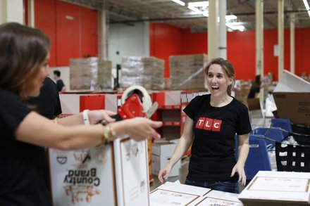 TLC employees helped to package more than 6,000 pounds of food at the Maryland Food Bank on Tuesday.