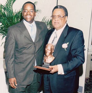 Mr. Muldrow was the recipient of the Henry G. Parks, Jr Business Award by the Baltimore Marketing Association December 7, 2000. He is shown here with son, Ackneil M. Muldrow, III (“Trey”)