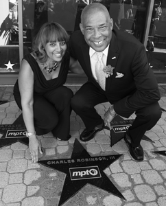 Charles Robinson, a reporter and associate producer at Maryland Public Television, is joined by his wife, Robbie Robinson, during his Walk of Fame installation in 2016 at MPT.