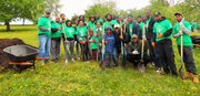 Volunteers cleaned up trash and debris, trimmed trees, placed mulch around trees and painted garbage cans at Carroll Park in Baltimore during the 15th annual Comcast Cares Day on Friday, April 29, 2016          
