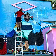 Comacell Brown, Jr. remembered seeing Carlester “Buckwheat” Smith, picking up trash, when he was a child. He along with other artists had the opportunity to lead the charge to celebrate the Annapolis icon by painting a mural, which was completed on July 12, 2020.