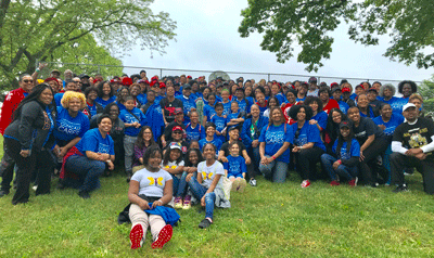 Comcast Cable employees and their families, friends and community partners, which included the Baltimore Alumnae Chapter of Delta Sigma Theta Sorority, Inc., all volunteered to clean and beautify Collington Square’s elementary school, recreation center and neighborhood.