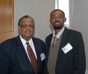Ackneil Muldrow, consultant, The Baltimore Times; and Ronald Smith, student at the College of Business at Coppin State University.