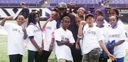 Baltimore Ravens safety Matt Elam with his team of kids at the Ravens Annual Team Challenge at M&T Bank Stadium on Monday, October 20, 2014. Selected students from Liberty Elementary School participated in challenges including: kickball, relay races and ultimate football under the guidance of Playworks Baltimore. The Ravens community-relations team spearheaded by Community Relations Manager Emily Scerba facilitated the activities during the event.   