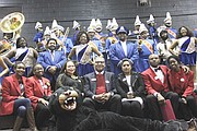 (Front row from left) Jennifer Brown, treasurer of the BCCC Student Government Association (SGA); Olayeni Popoola, 2016-17 student member of the BCCC Board of Trustees; BCCC student and Mistress of Ceremonies for the 70th Anniversary celebrations, Akiliah Radford; BCCC President/CEO Dr. Gordon F. May; Devone S. Delly, SGA president; and Fatoumata Doumbia, SGA secretary. Standing just behind the group are members of the Frederick Douglass High School Marching Band at the 70th Anniversary festivities at the Liberty Heights Campus on Friday, February 3, 2017.
