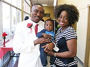 BCCC Associate Degree in Nursing graduate Rapheal Olumakinde with his wife, Temmy and new son, Saint.             