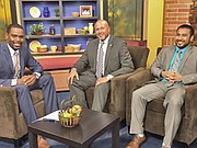 (Left to right) Marcus Washington, WJZ-TV news anchor; Roland Selby, executive director, Year Up Baltimore; and Year Up Baltimore student Adam Megahed on the set of WJZ-TV's program 