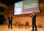 Damion Thomas, Sports Curator for Smithsonian’s National Museum of African American History and Culture and David Royle, Executive Vice President of Programming and Production for Smithsonian Channel answering questions.                            