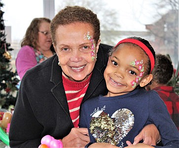Baltimore Times publisher Joy Bramble and granddaughter Sydney.