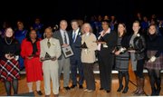 (Left to right) Community Service Award Winners Margaret Strong; Rochelle Mariano; Nelson Moody Sr.; keynote speaker Morris Dees, founder of the Poverty Law Center; Dr. Levi Watkins Jr. retired Johns Hopkins University professor and founder of the Annual Martin Luther King Jr. Commemoration; and Community Service Award Winners Janine Coy; Harlisha Martin; Theresa Barberi; Danielle Chi (wife of Dr. Albert Chi, who accepted the award on his behalf because of his deployment); and Adi Noiman at the 33rd Annual Martin Luther King, Jr. Commemoration at Johns Hopkins Medicine's Turner Auditorium on Friday, January 9, 2015.                                               