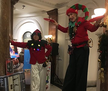 City Hall was packed with toys to give away while elves roamed freely