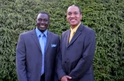  Lamin Jatta, president of the Kunta Kinteh Family Foundation and his cousin Chris Haley.       