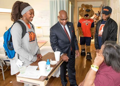 Hospital patients receive holiday cheer, gifts from MSU student-athletes