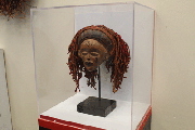 Originating in Ghana, the Mwana Pwo, a mask representing a maiden ready for marriage, sits on display at the Sankofa Children's Museum.