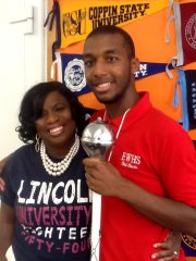 Edmondson-Westside High School counselor Phyllis White-Coley and student Xavier Clark. 