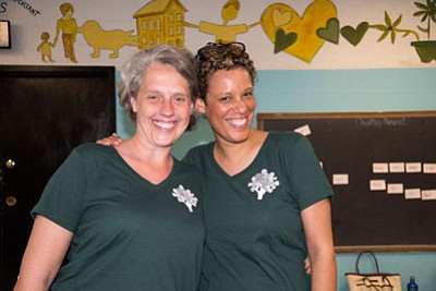 L-r: Kyla Liggett-Creel, LCSW-C, PhD, and Henriette Taylor, MSW, LGSW, celebrate a successful graduation ceremony for “Parent University,” a Promise Heights program