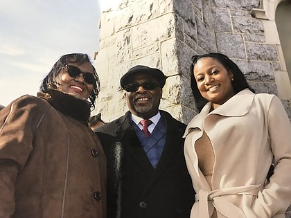 Pastor Johnson pictured with his wife (left) the Rev. Robin D. Johnson, and youngest daughter Amanda (right).