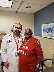 Dr. Christian Rolfo and patient Carol Pitts Wilson. Dr. Rolfo is treating Pitts Wilson for a carcinoid tumor.