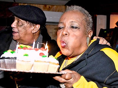 Rosa and her :Boo-Boo” (Shorty) at Roots Lounge on Smallwood and Vine Streets in West Baltimore.  I needed a lot of wind to blow out all my candles on my cake.
