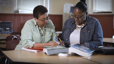 A volunteer tutor from BGE assists a GED learner at SBLC, which provides a supportive, rigorous and transformative education for adults of all ages and demographics who are eager to learn, who are motivated to succeed and who are committed to making a difference in their lives and in those of others. 