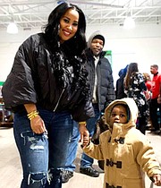 Tammy Rivera Malphurs of VH-1’s Love & Hip Hop: Atlanta and a child during the event.