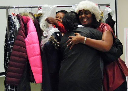 High school girls surprised with new coats