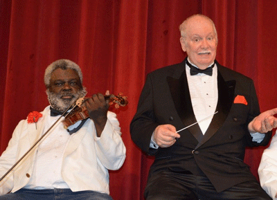 Violinist Rodney Allen and band Conductor Lynn Summerall.