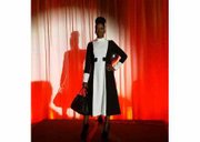 New York fashion model, Ty'Ann Brown wears one of the dresses on the runway featured in the TV show Single Ladies. The dress was designed by Annapolitan, Bishop Craig Coates. He strives to modernize what women clergy look like in a flattering way.