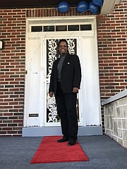 The door to recovery. Light of Truth (LTC) Founder Vaile Leonard pictured in front of one of the organization’s locations.