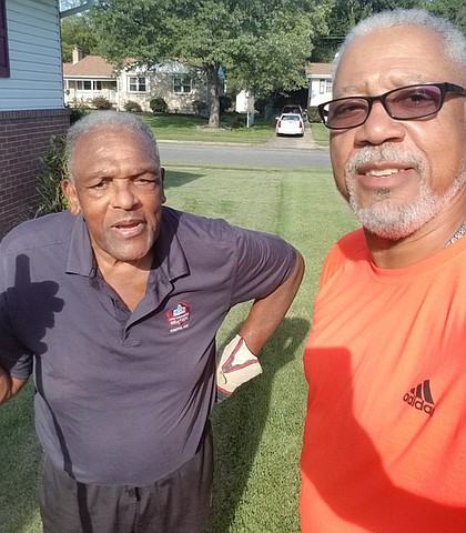 Still going strong and doing yard work at age 81, Baltimore Colts legend and NFL Hall of Famers, Lenny Moore #24 with his friend and next-door neighbor, Reggie Wilson his next-door neighbor. God bless them both.