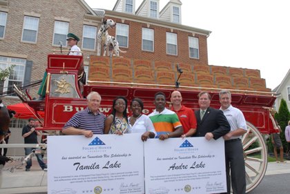 Budweiser Clydesdales deliver scholarships to Laurel military family