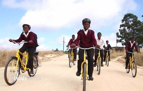 How an African cycling team is improving the odds for schoolchildren