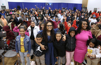 DuVernay takes a photo with the students attending the screening at the Dollarhide Community Center in Compton on March 2, 2018.