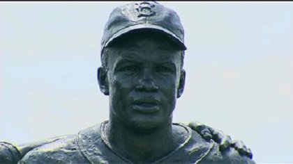 Vandals mark racial slurs on Jackie Robinson statue
