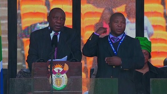 Mandela memorial interpreter asks forgiveness, calls himself champion