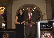 Baltimore City Sheriff John W. Anderson receives this year's Shield Award from SAO at the first Winter Solstice 2015 