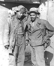 Louis S. Diggs, (right) a member of the 726th truck company with his brother George A. Diggs, a member of the 24th Infantry Regiment. They spent Christmas of 1951 together in Korea.