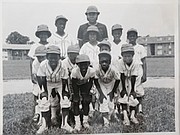 The James Mosher Giants, 1975. Reginald Exum (last row, second from left) and Thomas White III, coach