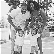 Chambers-Harris and her husband Dr. Rashad Dupree-Harris (M.D.) with their children four-year-old twins Ezra and Landon.