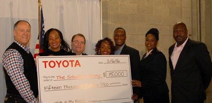 Michael Rouse, vice president of diversity, philanthropy and community affairs for Toyota Motors North America; Alva P. Adams-Mason, director of African American business strategy for Toyota; Major Gene A. Hogg, area commander of The Salvation Army of Central Maryland; comedienne, Meshelle; Avery Cook; Lt. Kimberly Harvey from The Salvation Army; and Tim Hale celebrate the presentation of Toyota’s $15,000 donation to The Salvation Army of Central Maryland.