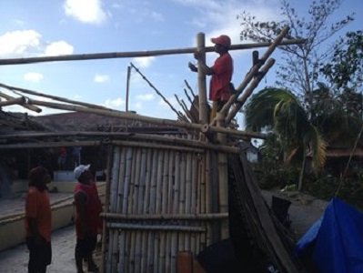 Scenes of hope and devastation after Typhoon Haiyan